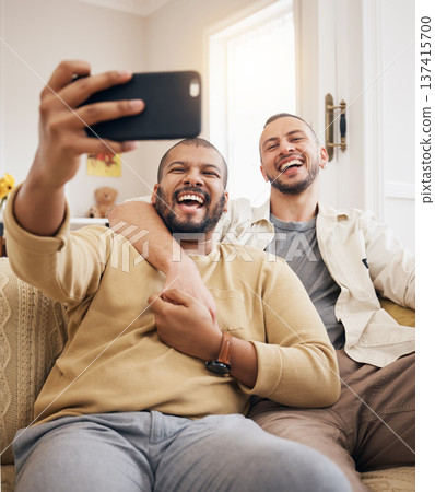 Men, lgbtq couple laughing and selfie in home living room, bonding and funny together. People, gay and profile picture, happy memory or smile on social media in love, care and interracial hug on sofa Men, lgbtq couple laughing and selfie in home living room, bonding and funny together. People, gay and profile picture, happy memory or smile on social media in love, care and interracial hug on sofa 137415700
