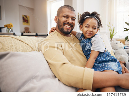 Smile, portrait and girl with her father on a sofa in the living room relaxing and bonding together. Happy, love and child sitting with her young dad from Mexico in lounge of their modern family home 137415789