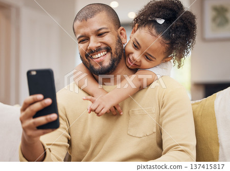Home, father and girl with a smile, selfie and hug with social media, family and loving together. Embrace, parent or female child on a sofa, profile picture or memory with love or bonding in a lounge Home, father and girl with a smile, selfie and hug with social media, family and loving together. Embrace, parent or female child on a sofa, profile picture or memory with love or bonding in a lounge 137415817