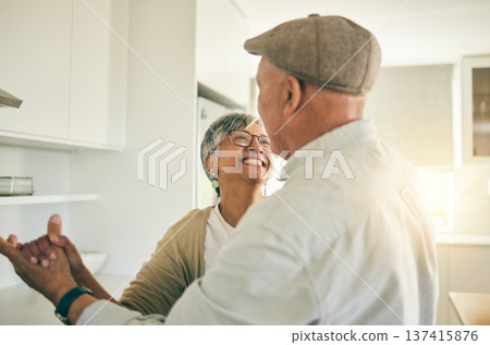 Old couple, dancing in kitchen and happiness with retirement, life partner and love with romance at home together. Dancer, support and trust with marriage, man and woman in healthy relationship Old couple, dancing in kitchen and happiness with retirement, life partner and love with romance at home together. Dancer, support and trust with marriage, man and woman in healthy relationship 137415876