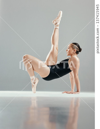 Balance, ballet or woman stretching in studio for body flexibility, freedom or creative performance. Pose, dancer or girl ballerina training legs to exercise or practice routine on white background Balance, ballet or woman stretching in studio for body flexibility, freedom or creative performance. Pose, dancer or girl ballerina training legs to exercise or practice routine on white background 137415945