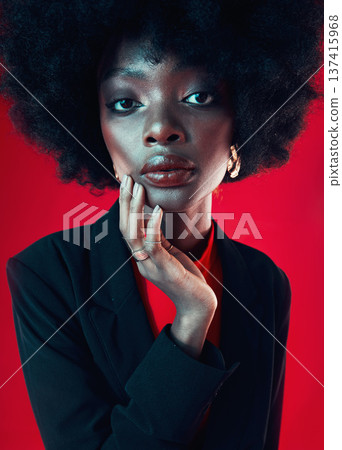 Black woman, face and afro, hair and beauty, makeup and shine isolated on red background. Hairstyle, haircare and texture with growth, skin glow in portrait and confident African model in a studio Black woman, face and afro, hair and beauty, makeup and shine isolated on red background. Hairstyle, haircare and texture with growth, skin glow in portrait and confident African model in a studio 137415968