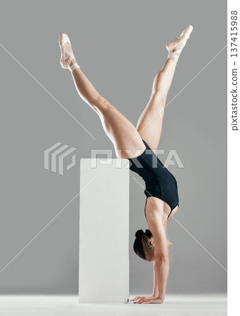 Balance, ballet or woman in studio on a handstand, block or platform for elegant routine or creative freedom. Flexible, dancer or girl ballerina dancing or training to exercise on white background Balance, ballet or woman in studio on a handstand, block or platform for elegant routine or creative freedom. Flexible, dancer or girl ballerina dancing or training to exercise on white background 137415988
