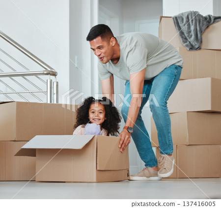 Father, playing and girl in box on floor in living room for celebration, freedom and happiness of new home. Happy, dad and child excited and having fun with property, investment and real estate 137416005