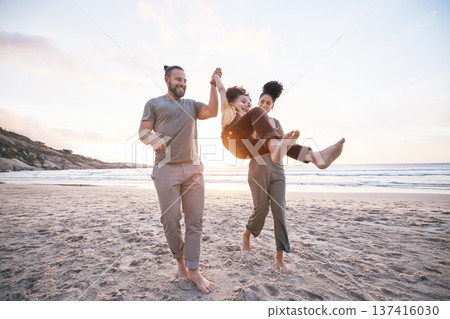 Happy, swing and holding hands with family at beach for bonding, summer vacation and travel. Smile, sunset and relax with parents and child walking on seaside holiday for love, freedom and support Happy, swing and holding hands with family at beach for bonding, summer vacation and travel. Smile, sunset and relax with parents and child walking on seaside holiday for love, freedom and support 137416030