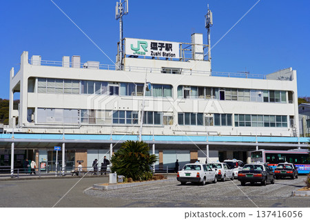 JR Zushi Station on a sunny day and a taxi parked at the rotary JR Zushi Station on a sunny day and a taxi parked at the rotary 137416056