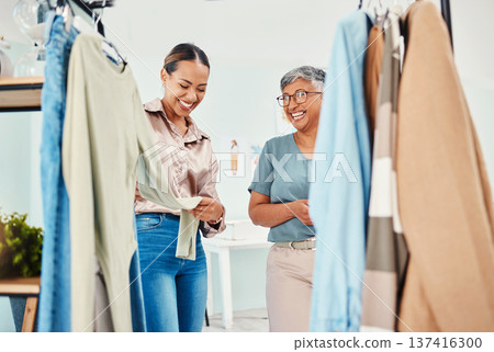 Luxury, customer and employee with fashion, shopping and sales with clothes, retail and conversation. Happy women, people or client with shop assistant, choice or product with discount deals or store Luxury, customer and employee with fashion, shopping and sales with clothes, retail and conversation. Happy women, people or client with shop assistant, choice or product with discount deals or store 137416300