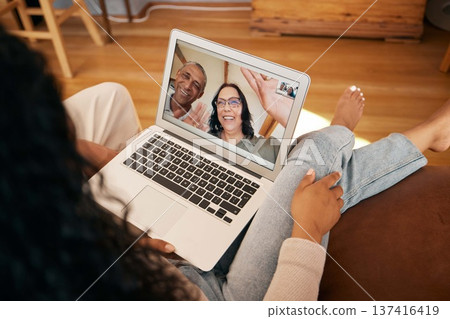 Video call, laptop screen and woman wave on home sofa for communication, contact or hello. Smile, virtual meeting and friends with person in lounge for online chat, conference or social media Video call, laptop screen and woman wave on home sofa for communication, contact or hello. Smile, virtual meeting and friends with person in lounge for online chat, conference or social media 137416419