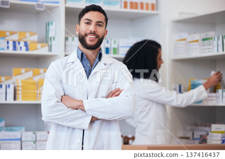 Medicine, pharmacy and portrait of healthcare man at shelf with pills, stock or medication. Pharmacist person or medical staff with arms crossed and smile at pharmaceutical, drugstore or retail shop 137416437