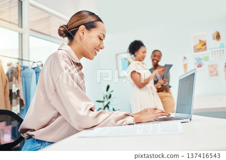 Laptop typing, woman and at a boutique for fashion, communication and working in retail. Smile, ecommerce and a female stylist or girl with a computer for online website for a clothing store 137416543