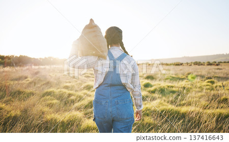 Walking, sack or farmer farming on grass field harvesting production in small business to trade. Back, supply chain or person working with bag for sustainability or agro development in countryside Walking, sack or farmer farming on grass field harvesting production in small business to trade. Back, supply chain or person working with bag for sustainability or agro development in countryside 137416643