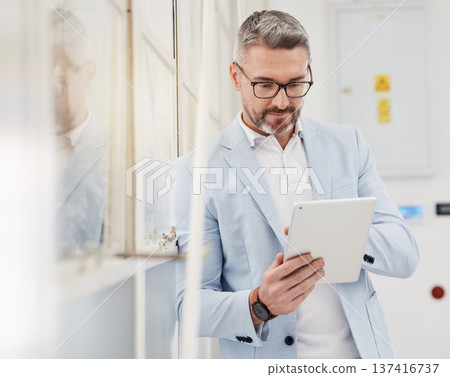 Tablet, online and businessman search information on the internet for company growth and planning on an app. Web, corporate and entrepreneur or person typing email, reading or working on schedule 137416737