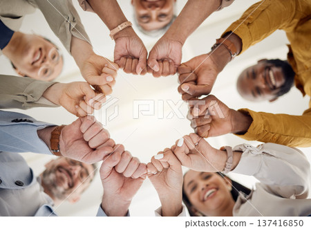 Team building, fist bump and business people portrait in office for teamwork, support or faith from below. Diversity, hands and team face together sign for union, trust and partnership or motivation Team building, fist bump and business people portrait in office for teamwork, support or faith from below. Diversity, hands and team face together sign for union, trust and partnership or motivation 137416850