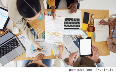 Business people, team hands and documents for meeting, planning and branding or marketing proposal above. Teamwork on digital tablet, paperwork and computer for collaboration on website design mockup Business people, team hands and documents for meeting, planning and branding or marketing proposal above. Teamwork on digital tablet, paperwork and computer for collaboration on website design mockup 137416915
