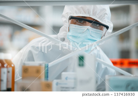 Lab portrait, PPE and face of person for safety security, cleaning hospital clinic or contamination protection. Product shelf investigation, hazmat suit or healthcare worker for emergency danger risk 137416930
