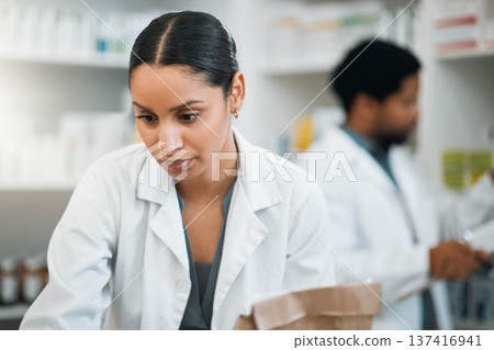 Pharmacy, medicine and inventory with woman in store for retail, pills and product. Shopping, medical and healthcare with pharmacist and stock for prescription, wellness and supplements dispensary Pharmacy, medicine and inventory with woman in store for retail, pills and product. Shopping, medical and healthcare with pharmacist and stock for prescription, wellness and supplements dispensary 137416941