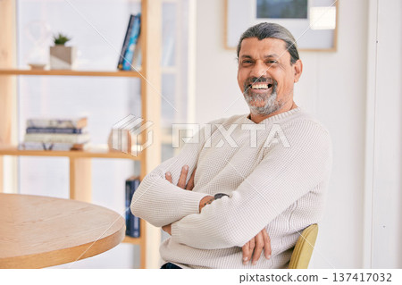 Happy, crossed arms and portrait of a man in the office with confidence and positive attitude. Smile, calm and professional mature male designer sitting on a lunch break in the modern workplace. 137417032
