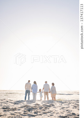 Love, travel and holding hands with big family on beach for vacation, bonding and summer. Freedom, care and relax with group of people walking at seaside holiday for generations, happiness and mockup Love, travel and holding hands with big family on beach for vacation, bonding and summer. Freedom, care and relax with group of people walking at seaside holiday for generations, happiness and mockup 137417113