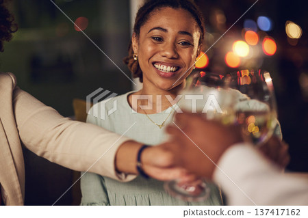 Dinner party, happy woman or friends toast alcohol for birthday support, congratulations or group celebrate at luxury gala. Night people cheers with champagne, wine or drink at fine dining restaurant 137417162