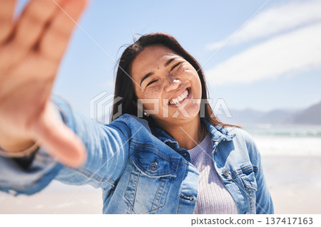 Happy, selfie and woman on beach for holiday, vacation or summer in Indonesia or profile picture for social media or memory. Portrait, smile and person at the ocean, sea or relax in nature for break 137417163