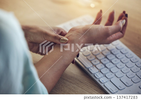 Wrist problem, computer keyboard or woman hands with carpal tunnel syndrome, osteoarthritis or joint pain. Closeup, copywriting typing fatigue and person with arthritis risk, fibromyalgia or injury Wrist problem, computer keyboard or woman hands with carpal tunnel syndrome, osteoarthritis or joint pain. Closeup, copywriting typing fatigue and person with arthritis risk, fibromyalgia or injury 137417283