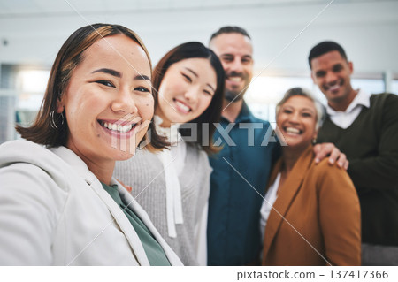 Selfie, portrait and group of business people smile in office for support of global team building. Diversity, employees and face asian woman with friends for profile picture about us on social media Selfie, portrait and group of business people smile in office for support of global team building. Diversity, employees and face asian woman with friends for profile picture about us on social media 137417366