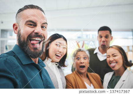 Portrait, selfie and group of funny business people in office for team building, collaboration and support. Diversity, teamwork and happy friends with silly faces for profile picture on social media 137417367