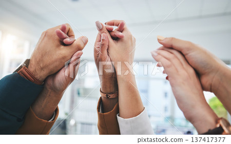 Closeup, business people and holding hands with support, partnership and collaboration with team building. Group, zoom or staff with solidarity, community or motivation with cooperation and coworking 137417377