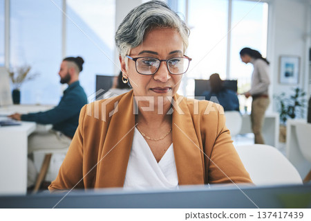 Business, thinking and senior woman with laptop, online reading and connection with network, website info and email. Corporate professional, consultant and employee with pc, planning and research Business, thinking and senior woman with laptop, online reading and connection with network, website info and email. Corporate professional, consultant and employee with pc, planning and research 137417439