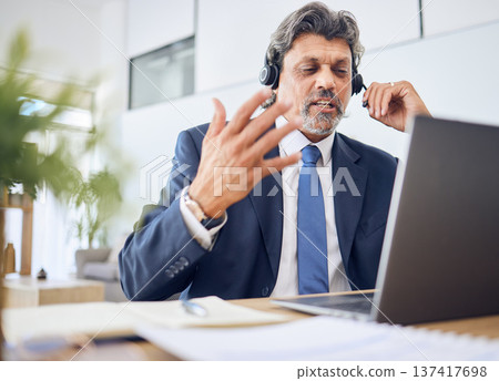 Business man, call center and computer for consultant in communication, sales or virtual meeting. Corporate agent, financial advisor or manager speaking on laptop or video for work from home webinar Business man, call center and computer for consultant in communication, sales or virtual meeting. Corporate agent, financial advisor or manager speaking on laptop or video for work from home webinar 137417698