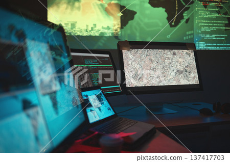 Computer, dark and monitor for global cyber security, government research or data capturing. Software, office and a desk with pc for world server, surveillance agency or information for analysis Computer, dark and monitor for global cyber security, government research or data capturing. Software, office and a desk with pc for world server, surveillance agency or information for analysis 137417703
