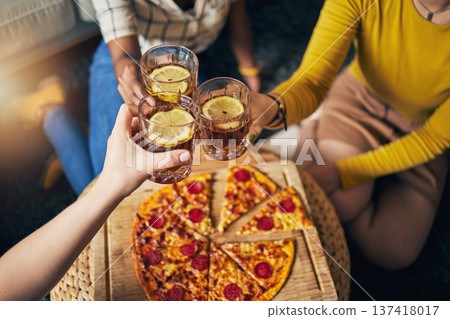Group hands, toast cocktail and pizza in home with celebration, party and closeup for alcohol, glass or juice. Friends, together and eating for event, culture or relax with success in lounge at house Group hands, toast cocktail and pizza in home with celebration, party and closeup for alcohol, glass or juice. Friends, together and eating for event, culture or relax with success in lounge at house 137418017