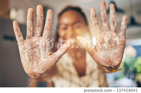 Hands, flour and baking by woman in a kitchen for bread, pizza or handmade food at home. Wheat, palm and female chef with messy fingers from cooking, fun and preparing diy, pasta or cake in her house Hands, flour and baking by woman in a kitchen for bread, pizza or handmade food at home. Wheat, palm and female chef with messy fingers from cooking, fun and preparing diy, pasta or cake in her house 137418041