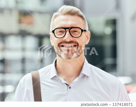 Mature business man, street and portrait with glasses, bag and happy for walk, travel or outdoor in metro. Entrepreneur, CEO or manager in city, traffic or sidewalk for excited smile on face in Milan Mature business man, street and portrait with glasses, bag and happy for walk, travel or outdoor in metro. Entrepreneur, CEO or manager in city, traffic or sidewalk for excited smile on face in Milan 137418071