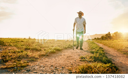 Environment, nature and relax with man on farm for sustainability, agriculture and ecology. Happy, peace and sunset with farmer on countryside field for summer, health and calm with mockup space Environment, nature and relax with man on farm for sustainability, agriculture and ecology. Happy, peace and sunset with farmer on countryside field for summer, health and calm with mockup space 137418082