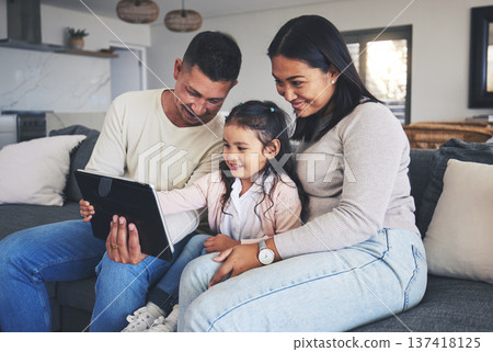 Happy family, girl or parents with tablet for elearning, info or studying for education or remote learning at home. Child development, dad or mom with kid reading online ebook or news on social media Happy family, girl or parents with tablet for elearning, info or studying for education or remote learning at home. Child development, dad or mom with kid reading online ebook or news on social media 137418125