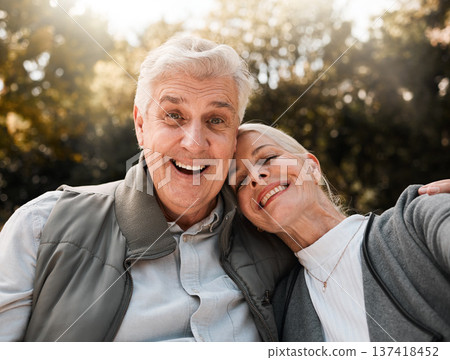 Happy, portrait and senior couple hug in a forest, love and bond in nature on a weekend trip together. Smile, face and romantic old woman embrace elderly male in woods, cheerful and enjoy retirement 137418452