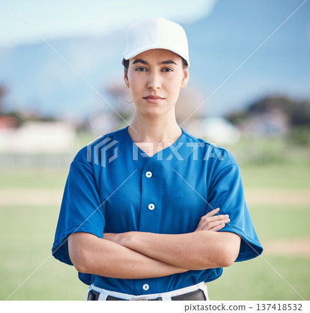 Sports, portrait and woman with arms crossed for baseball field training, workout or match. Fitness, face and softball player at a park proud, serious and mindset focus against blurred background 137418532