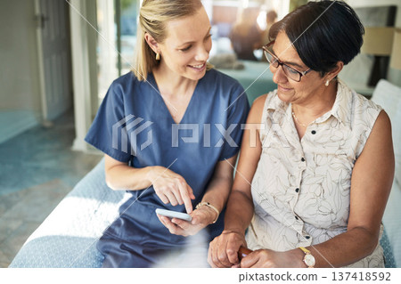 Happy woman, nurse and phone in elderly care for support, consultation or healthcare diagnosis at home. Female person, caregiver or medical professional on mobile smartphone to help senior patient Happy woman, nurse and phone in elderly care for support, consultation or healthcare diagnosis at home. Female person, caregiver or medical professional on mobile smartphone to help senior patient 137418592