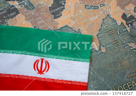 National flag of Iran on the world map background. Iran and USA war. Crisis and terrorism. National flag of Iran on the world map background. Iran and USA war. Crisis and terrorism. 137418727