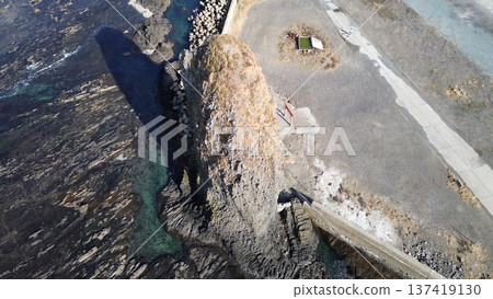 Candle Rock and the Sea of Japan coastline in Setana Town, Hokkaido, aerial view by drone 137419130