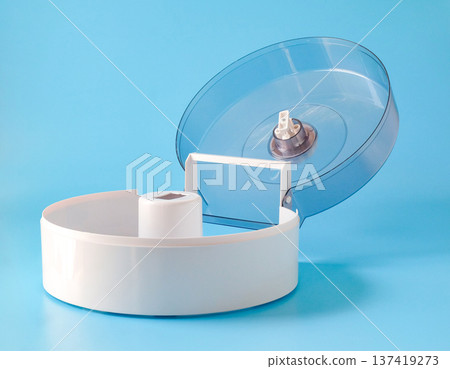 jumbo toilet roll dispenser made of plastc in a round shape. 137419273