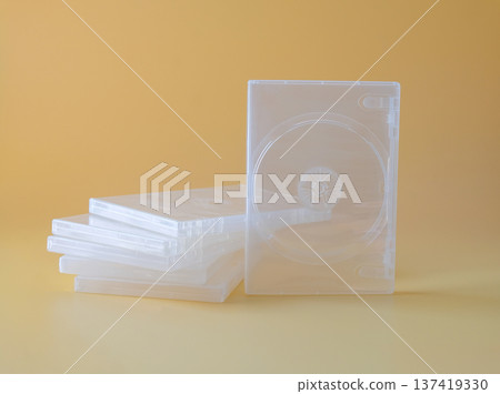Blank CD case or CD cover on color background. 137419330