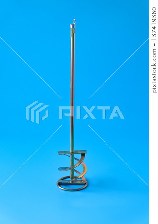 Paddle mixer for cement adhesive mortar connects to electric drill . 137419360