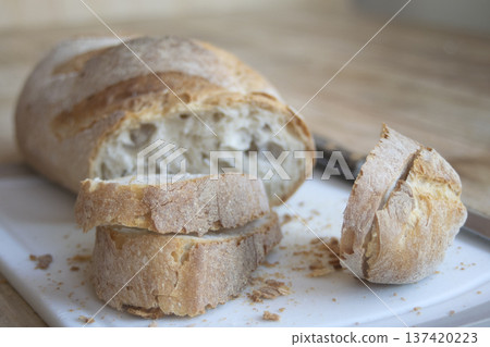 sliced artisan bread on board sliced artisan bread on board 137420223