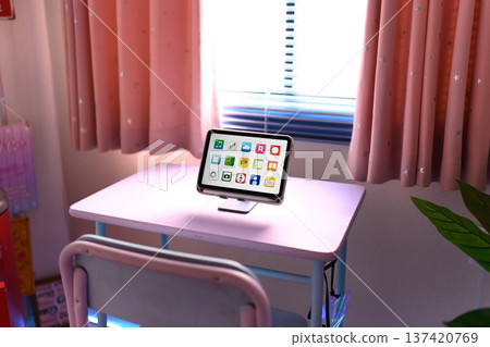 Tablet and window on desk Tablet and window on desk 137420769