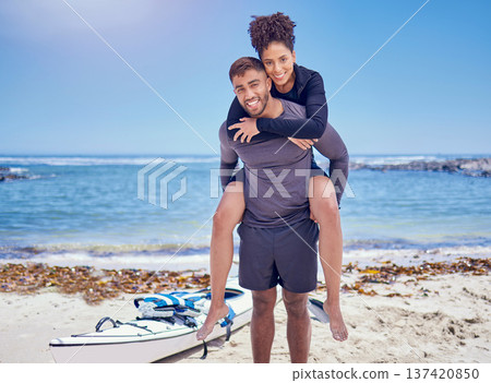 Sports, fitness and kayak couple piggyback at a beach for training, bond and workout in nature together. Kayaking, portrait and man carrying woman at sea for rowing adventure, workout or fun hobby Sports, fitness and kayak couple piggyback at a beach for training, bond and workout in nature together. Kayaking, portrait and man carrying woman at sea for rowing adventure, workout or fun hobby 137420850