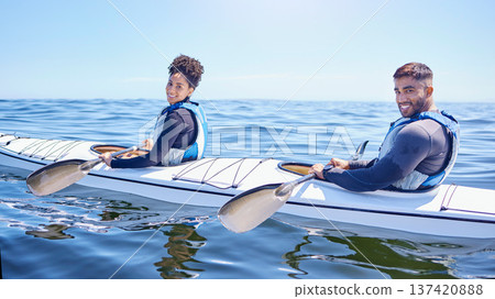 Ocean, portrait of happy man and woman in kayak at lake, beach or river for exercise challenge. Sports holiday, adventure and fitness, couple rowing in canoe for training workout and fun race at sea. Ocean, portrait of happy man and woman in kayak at lake, beach or river for exercise challenge. Sports holiday, adventure and fitness, couple rowing in canoe for training workout and fun race at sea. 137420888