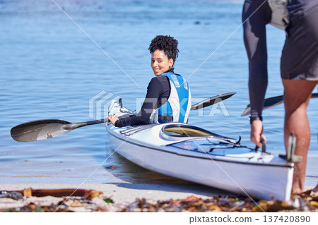 Water, portrait of woman in kayak and getting ready at lake, beach or river for exercise with smile. Ocean holiday, adventure and fitness, happy couple in canoe for training workout for sports at sea Water, portrait of woman in kayak and getting ready at lake, beach or river for exercise with smile. Ocean holiday, adventure and fitness, happy couple in canoe for training workout for sports at sea 137420890