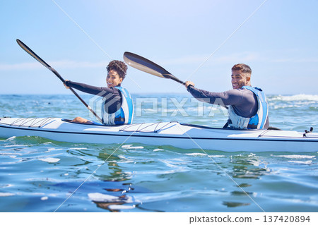 Water, portrait of man and woman in kayak for sports on lake, beach or river for exercise together on vacation. Ocean holiday, adventure and fitness, couple in canoe for training workout on blue sky. Water, portrait of man and woman in kayak for sports on lake, beach or river for exercise together on vacation. Ocean holiday, adventure and fitness, couple in canoe for training workout on blue sky. 137420894